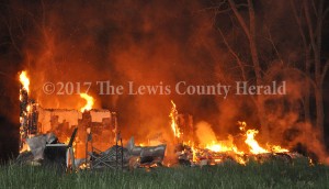 This vacant home at Dry Hollow was destroyed by fire Tuesday night. - Dennis Brown Photo