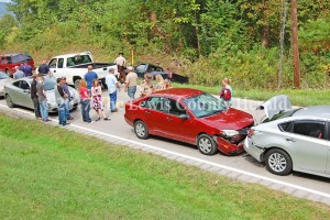 Two separate accidents resulted in a funeral procession being halted on Ky. Rt. 8 east of Vanceburg Tuesday afternoon. The driver of the black pick-up was taken to the hospital with a leg injury. Deputy Bryon Walker is investigating. - Dennis Brown Photo 